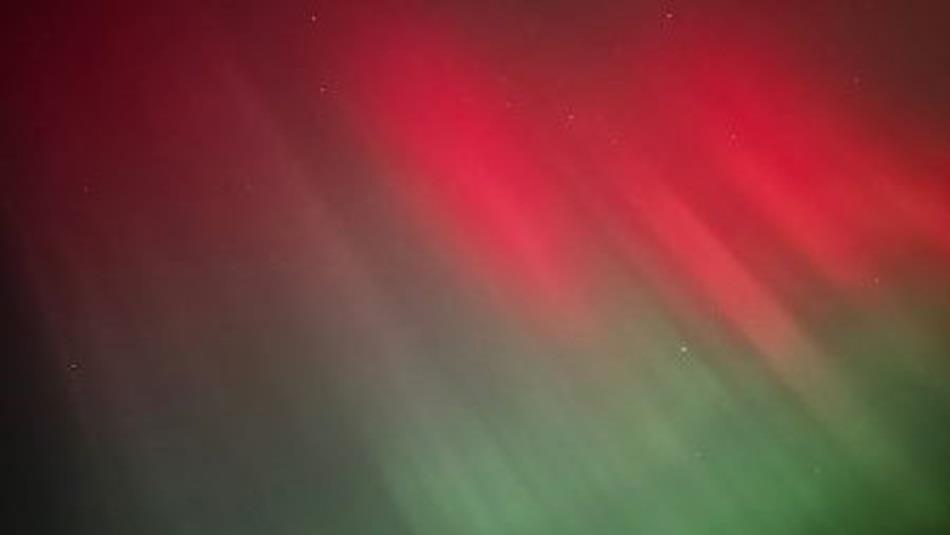 The Aurora Borealis in colours green and red