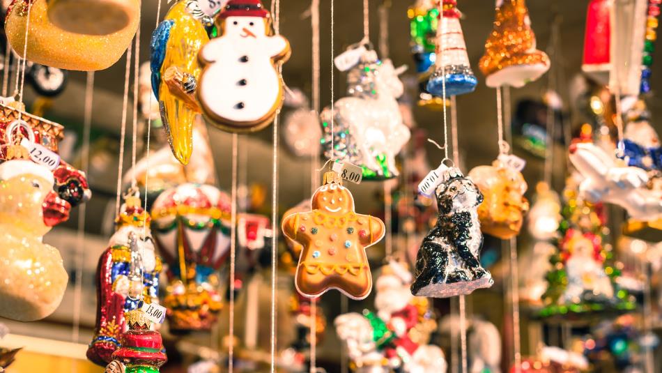 Christmas decorations hanging from Christmas market stall