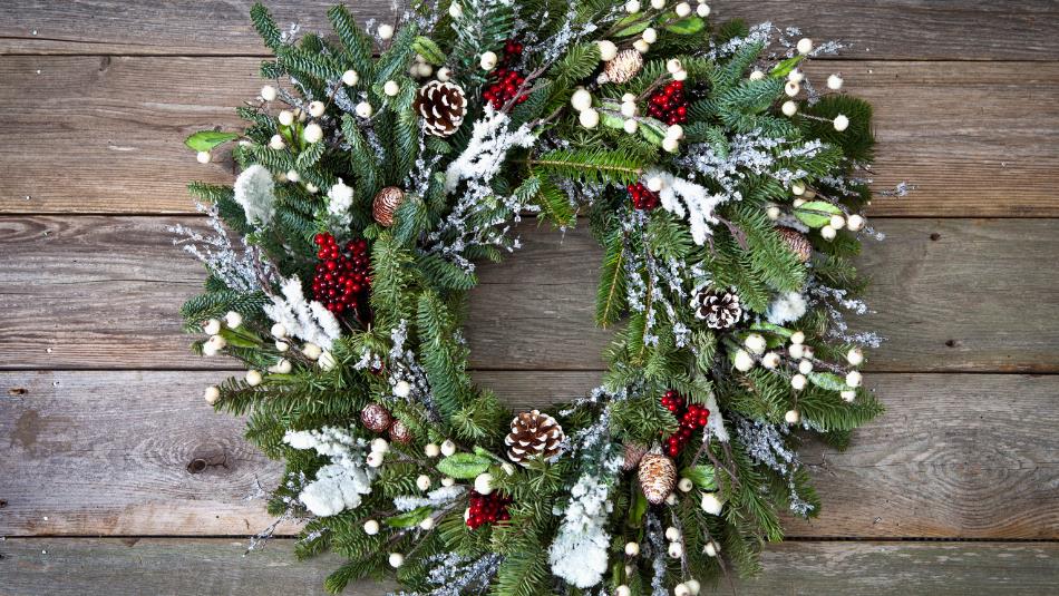 Christmas wreath on top of wood floor