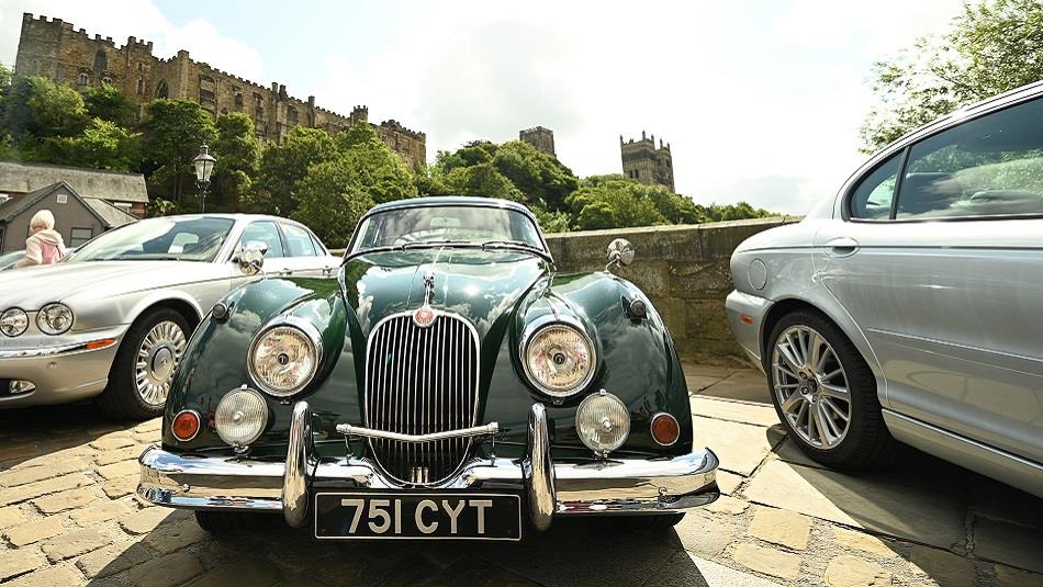 Classic Cars displayed on Framwellgate Bridge with Cathedral and Castle in the background. Durham Classic Car Show.