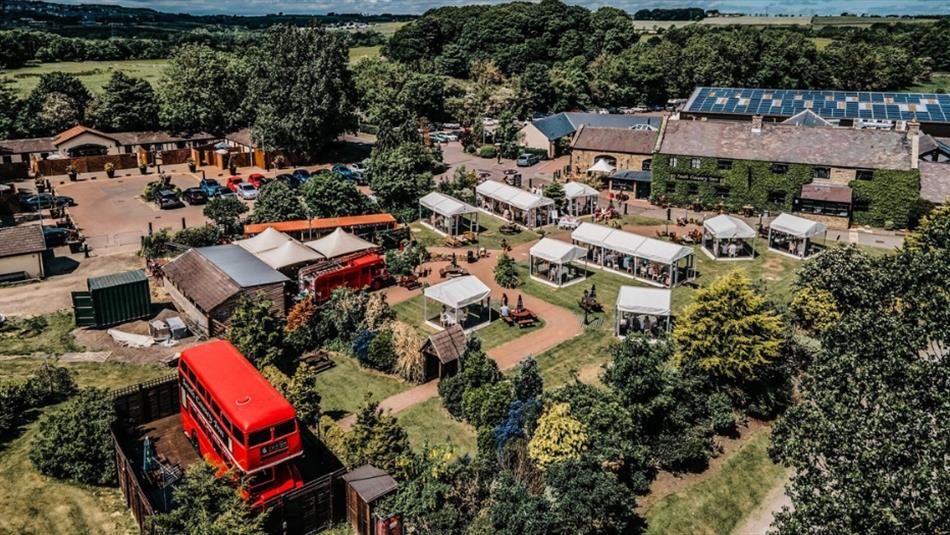 Aerial images showing a bus and buildings