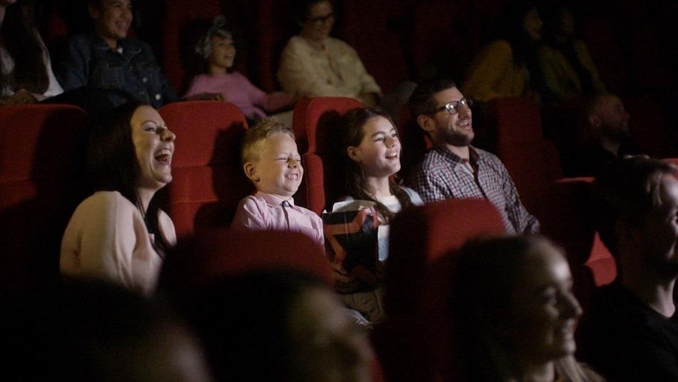 Family watching a movie at Cineworld.