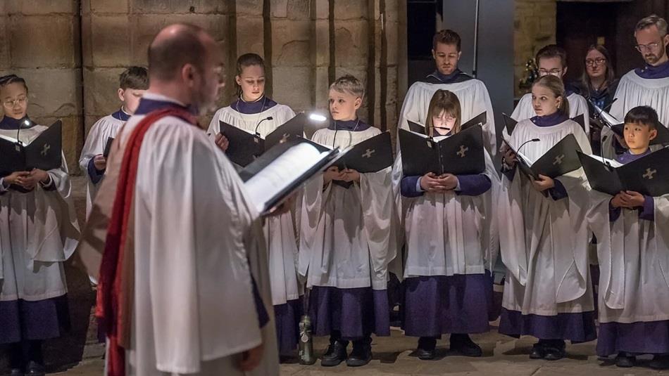 Members of the Durham Cathedral Choir performing.