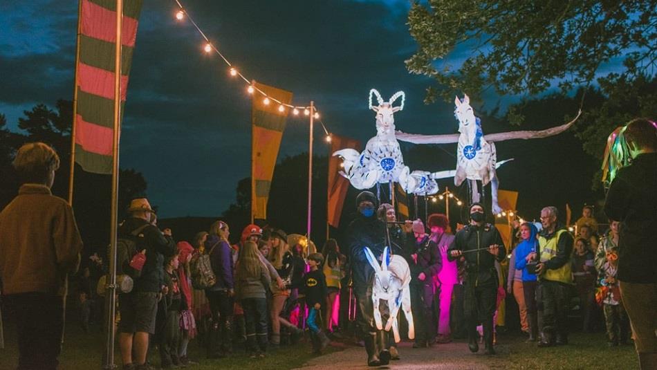 Illuminated puppets and spectators at The Glittering North Raby Castle