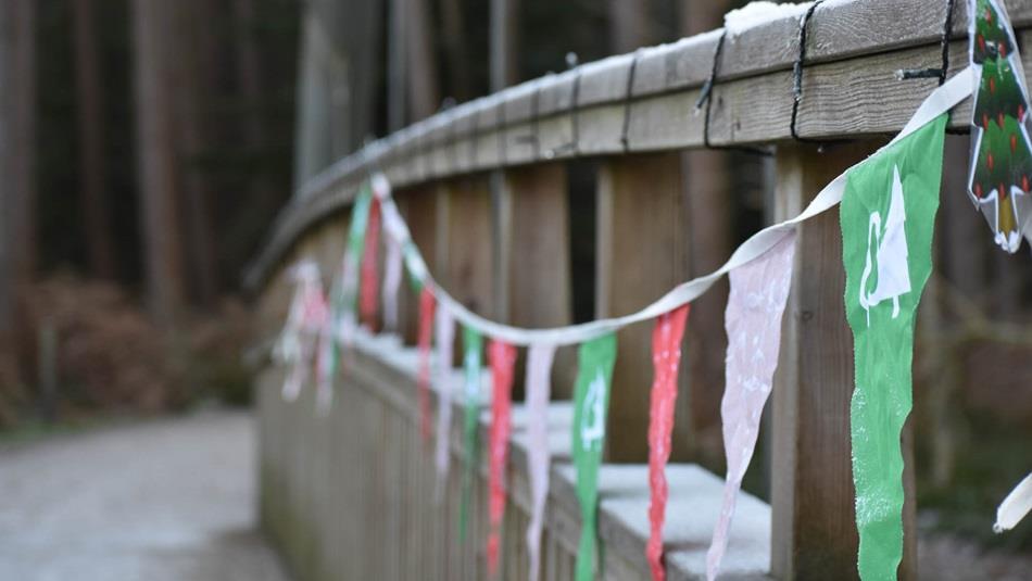 Hamsterley Christmas bridge with bunting.
Credit: Forestry England/Crown Copyright