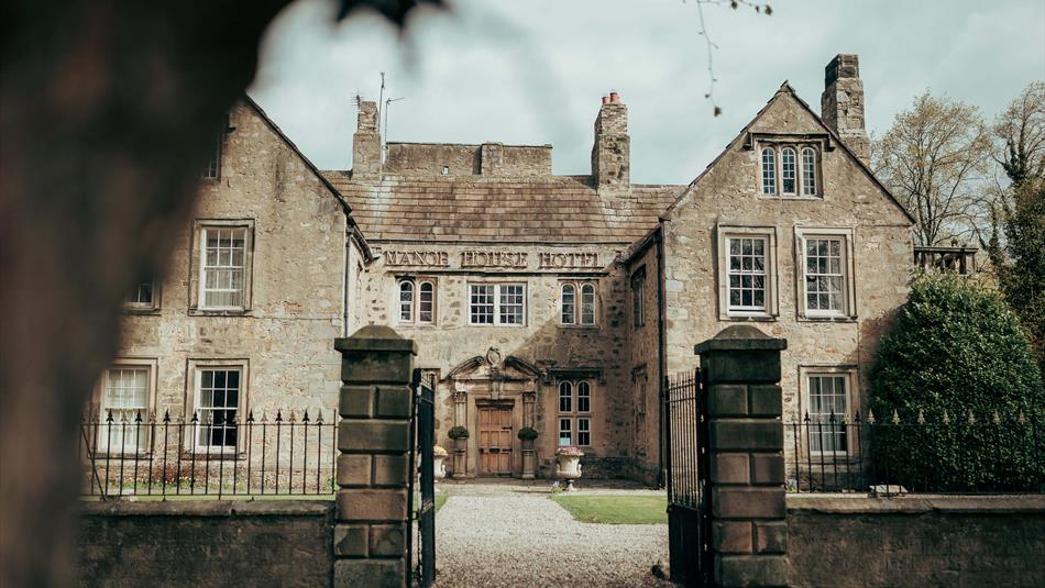 View of the front exterior of the Manor House Hotel