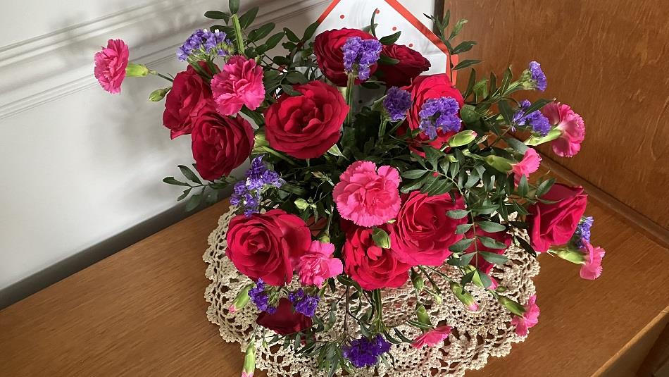 Flower arrangement in pinks, reds and purples