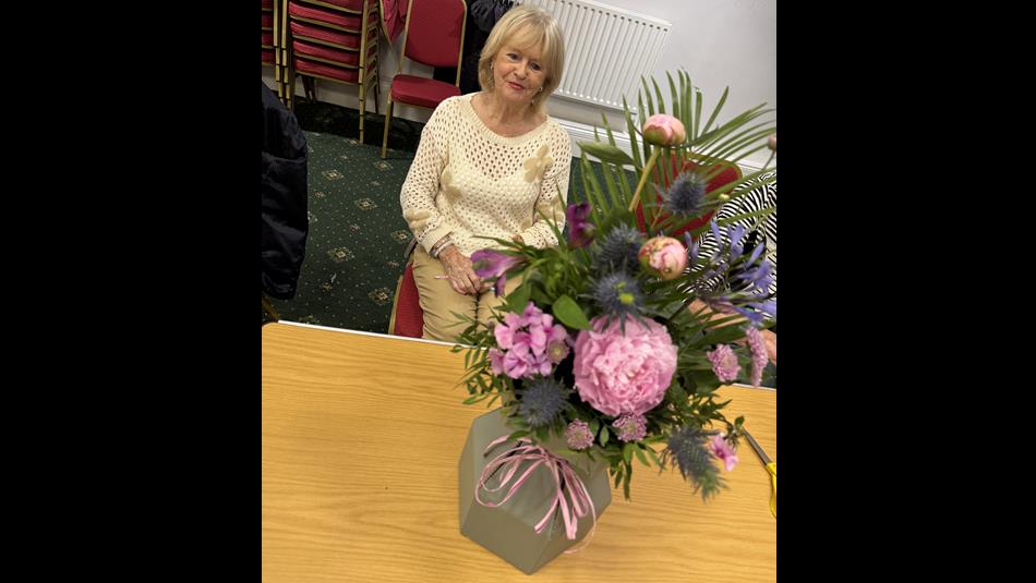 Club Member with her flower arrangement.