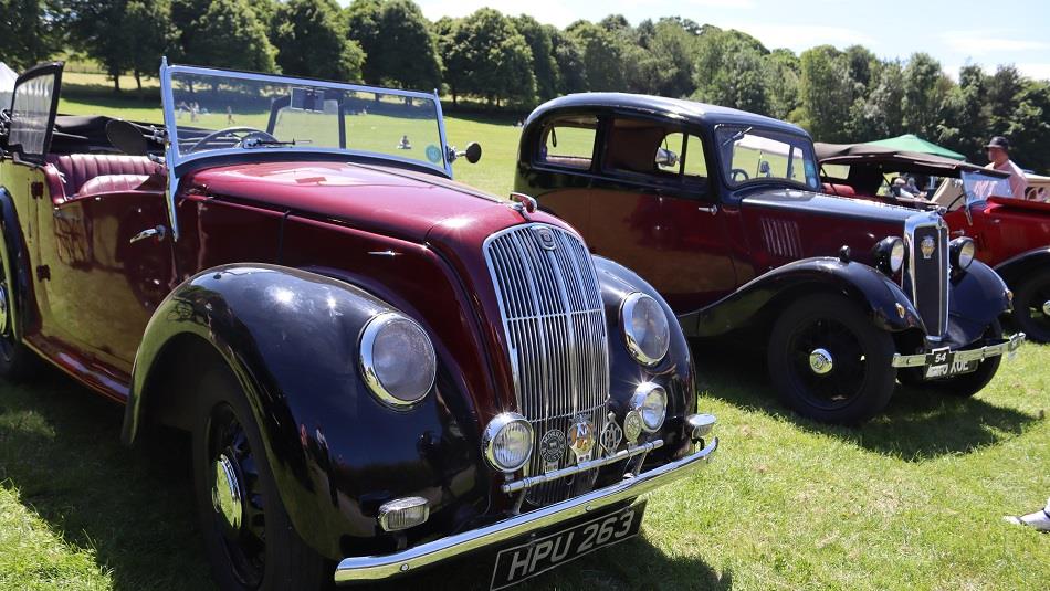 Classic Morris cars parked on a field at Beamish Museum