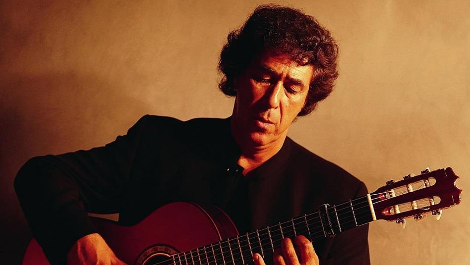 Juan Martin playing the guitar