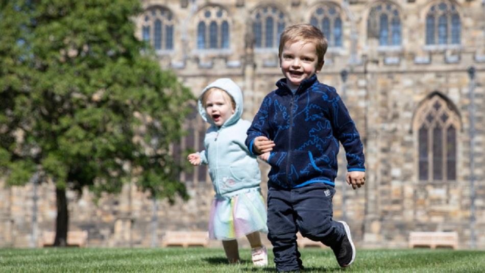 Two children playing in Auckland Palace gardens