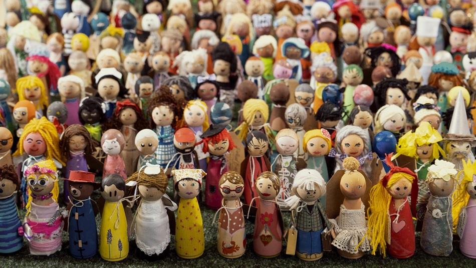 Hundreds of peg dolls.