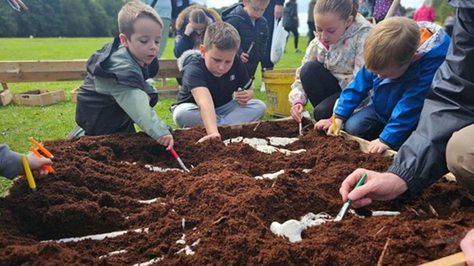 Children working on an Archaeological dig