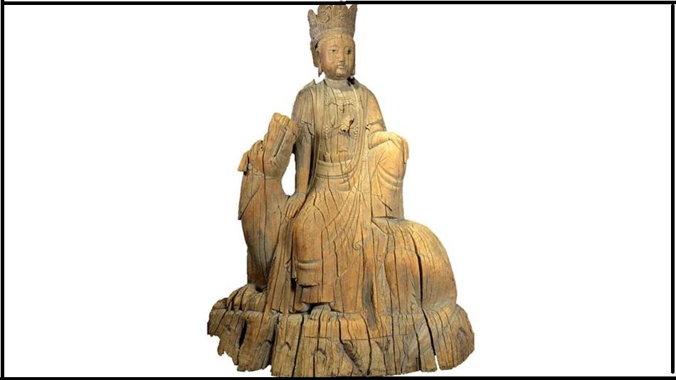 A wooden carving of the Buddhist figure of Guanyin