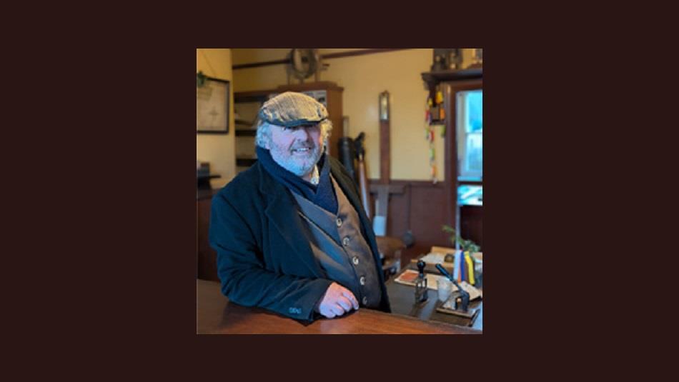 A man dressed in Collier's clothing at Beamish Museum