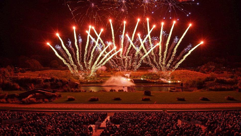 Audience watching the spectacular fireworks display from the arena: Pyromusical 2024