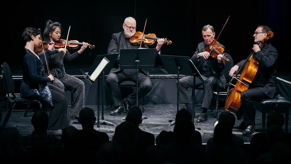 photo of 5 players from Royal Northern Sinfonia with stringed instruments