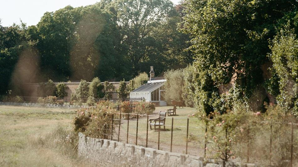Shrub Pruning Workshop. The grounds of Raby Castle with greenhouse in the distance.