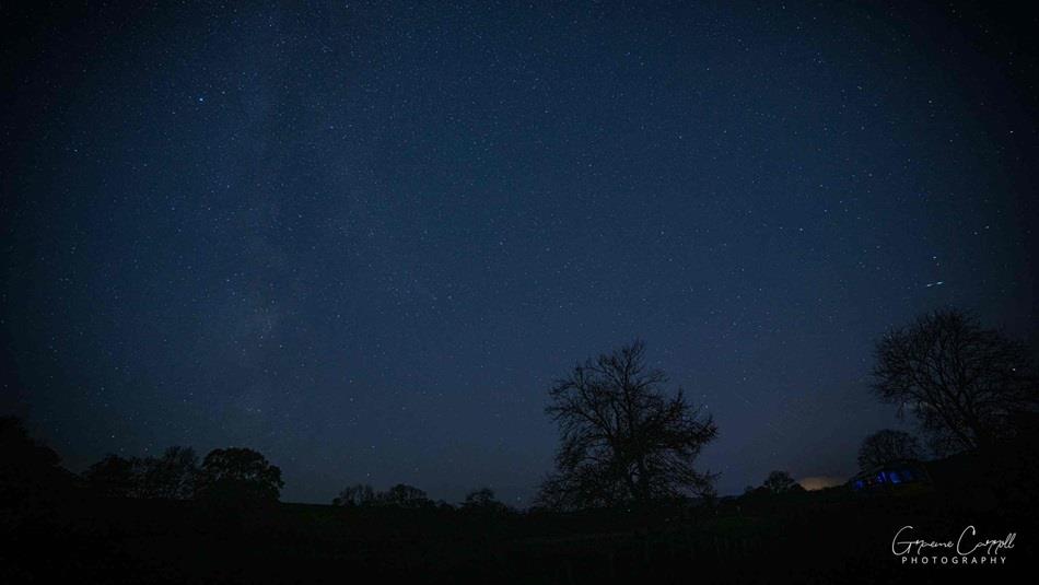 A dark starry sky.