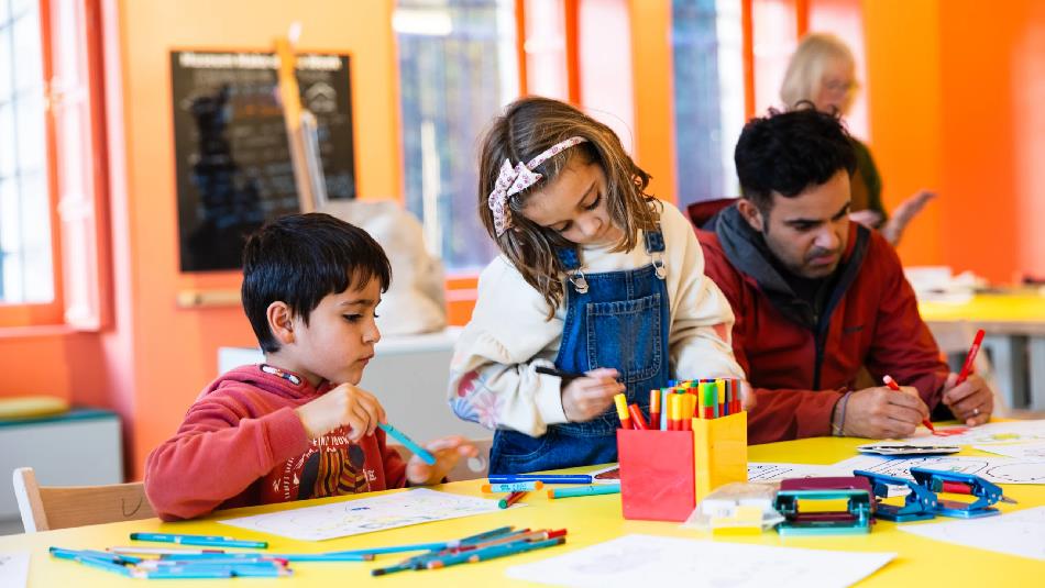 Children enjoying colouring-in their drawings. ©TheBowesMuseum