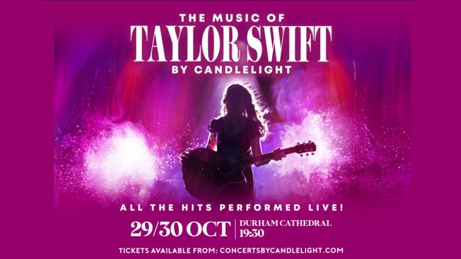 Taylor Swift performing on stage at a concert