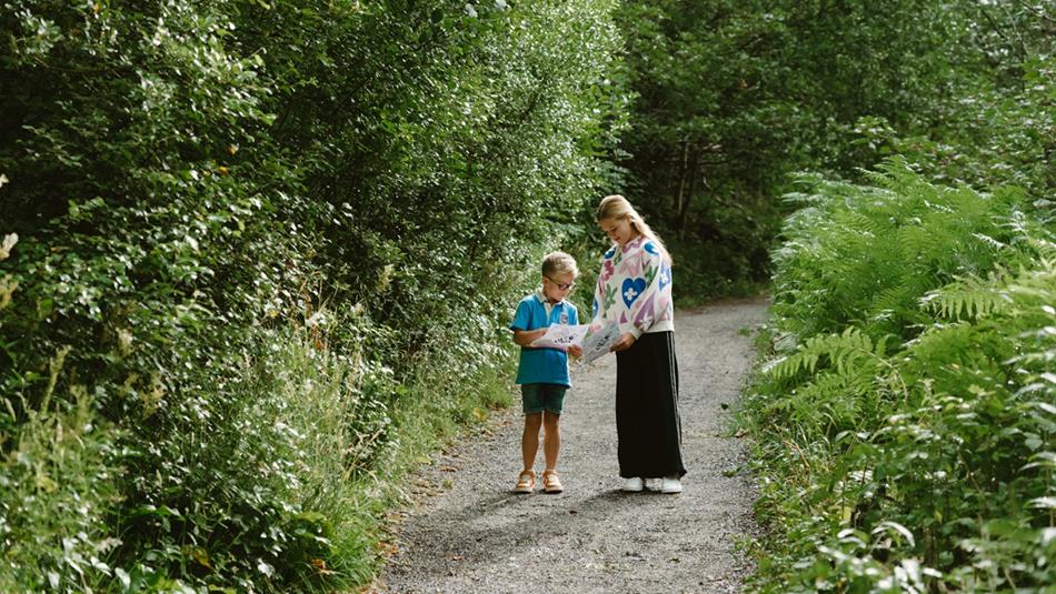Adult and child enjoying The High Force Carrot Patch Trail.