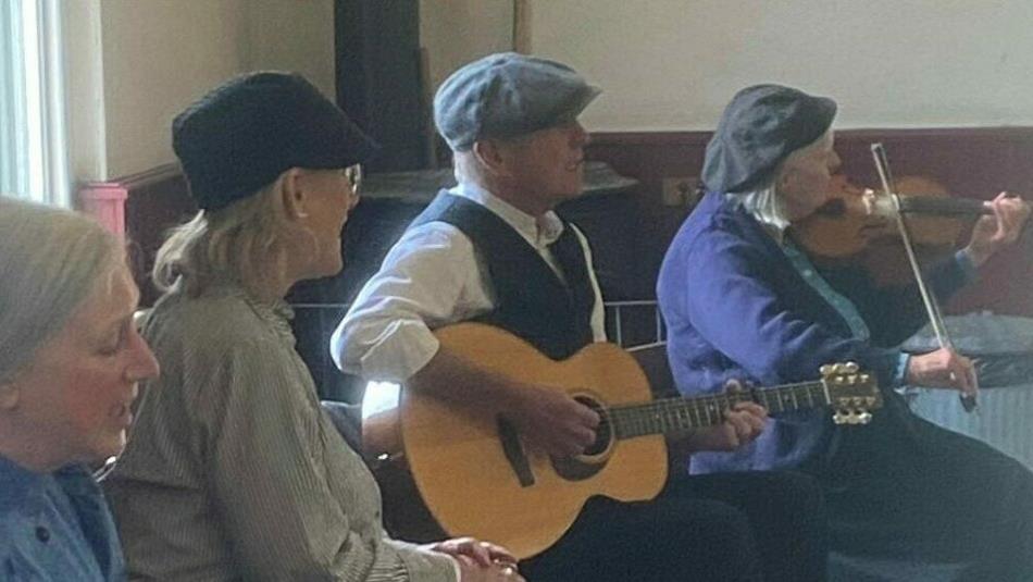 The Cloth Cappers performing in The Band Hall in the Pit Village