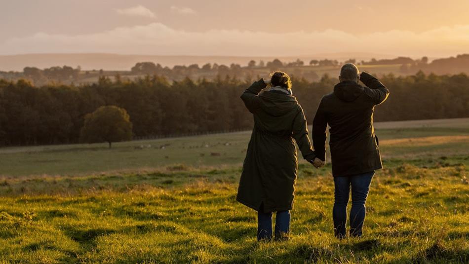 Social Sundays at Raby Castle - a couple walking through the grounds at Raby.