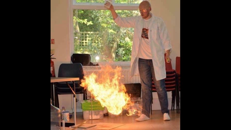 A scientist conducting an experiment with fire - Big Science.