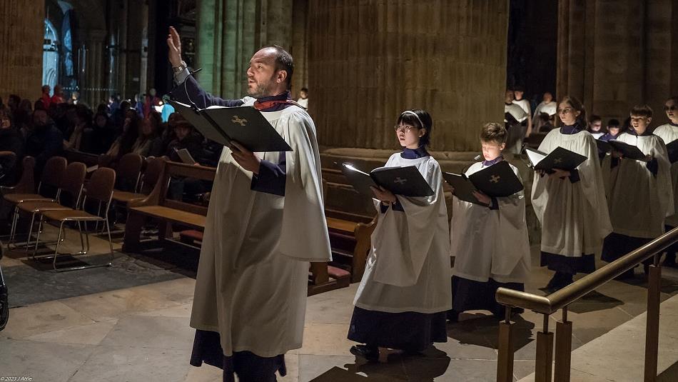 The sound of the Vespers for Christmas sung in half-light by the Cathedral's Lay Clerks and Choral Scholar