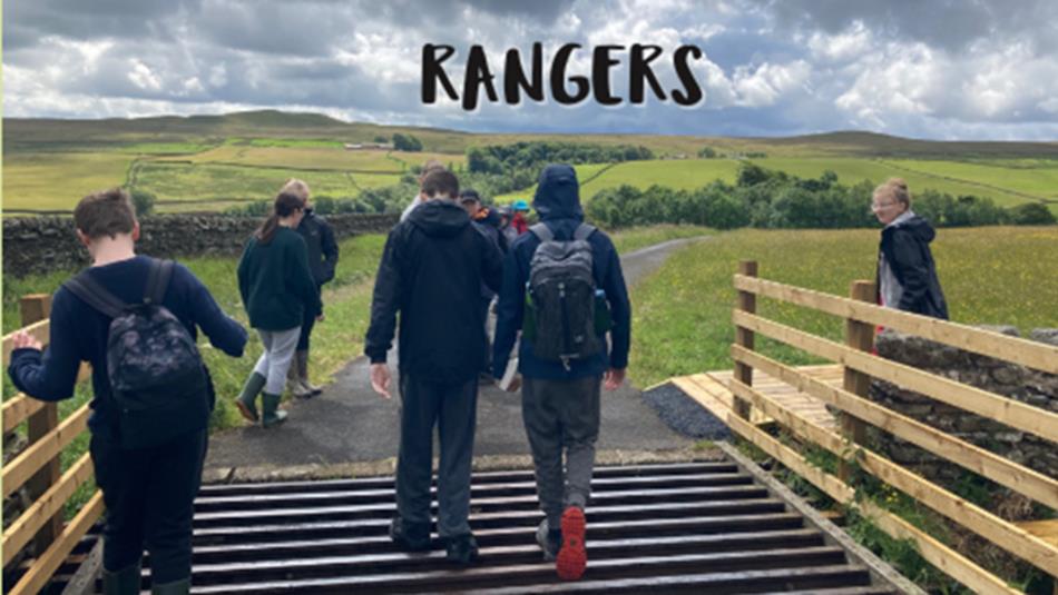 A group of children walking in the countryside