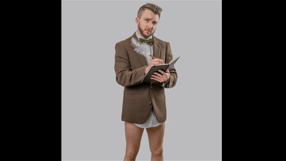 Phil Green writing in a notebook, wearing a suit (top half) minus trousers.
