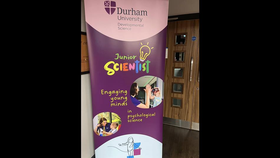 Junior Scientist banner at Durham University showing photos of children and adults high-fiving each other and doing activities together.