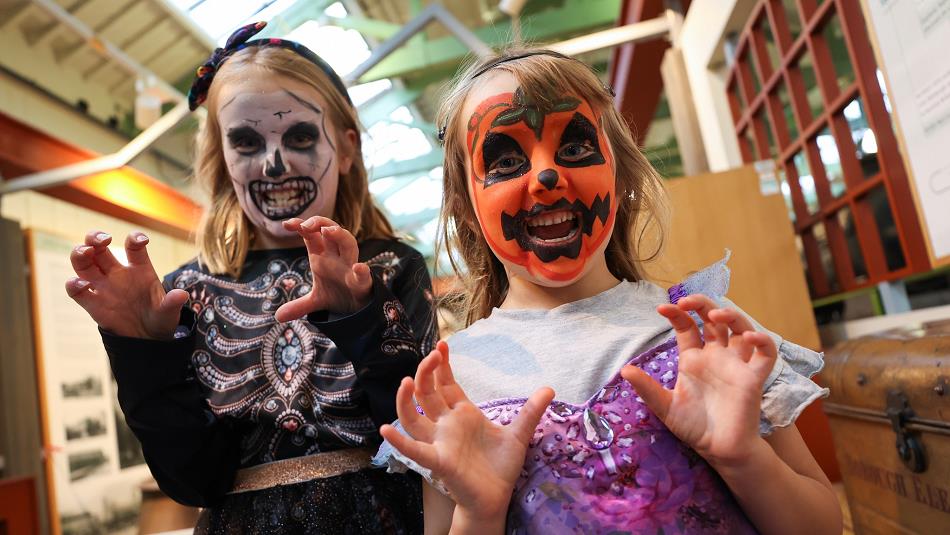 Two children in Halloween costumes, with painted faces at Hopetown Darlington.