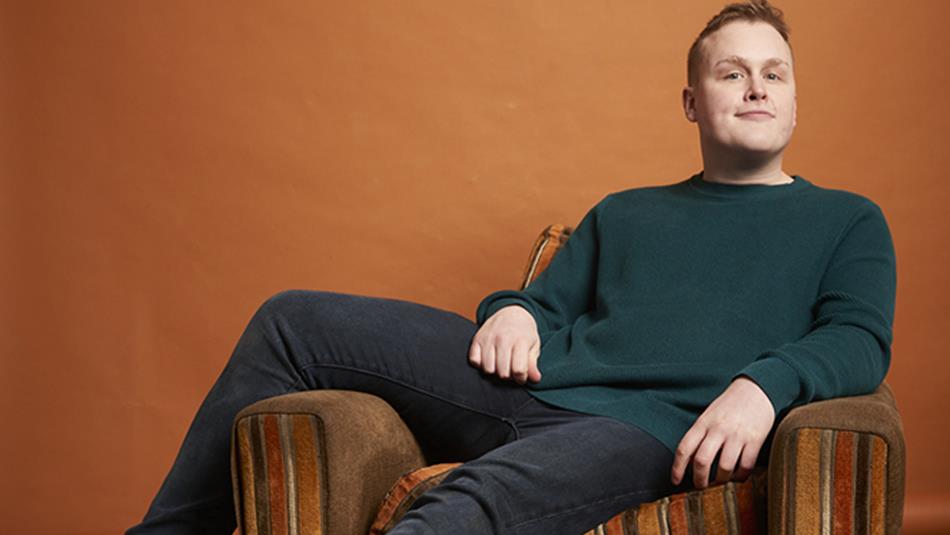 Josh Jones reclining in a chair