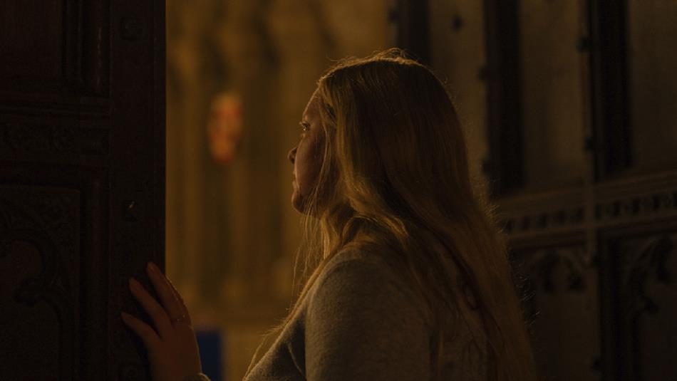 A woman peering out of one the Cathedral’s secret spaces that are rarely open to the general public.