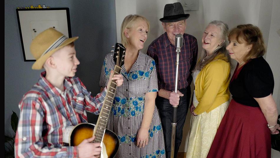 Band members performing together - 'Hop Skiffle Jump'