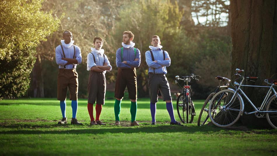 Actors, 'The Handlebards', lined up with their arms crossed at Raby Castle, Park and Gardens.