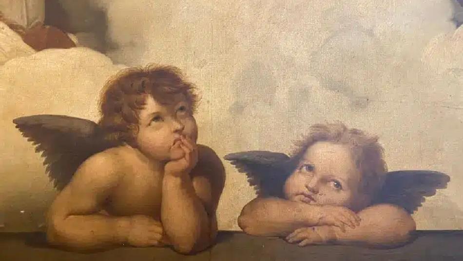 Two young angels looking upwards