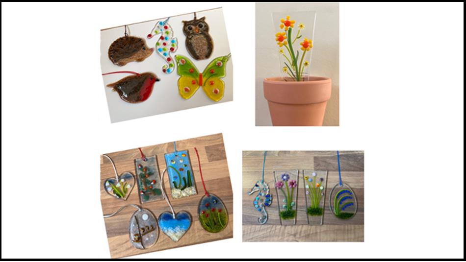 Various colourful items made from fused glass: hearts, butterflies, hedgehogs, owls and flower designs.
