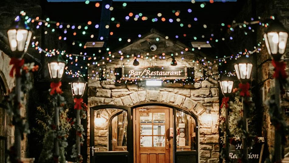 Fairy lights and warm lighting leading to South Causey Inn's Bar and Restaurant area.