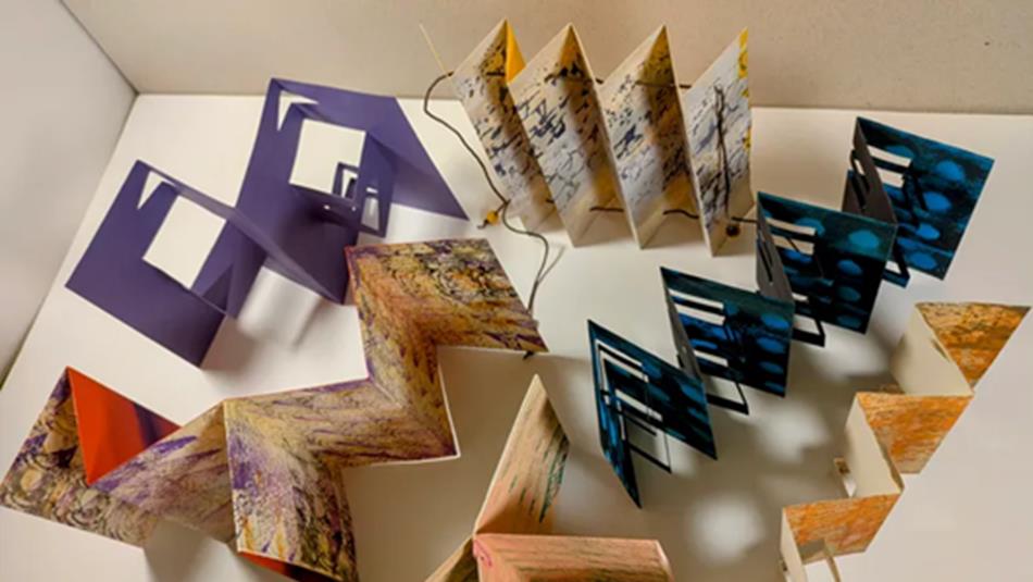 Handmade folded books in a variety of forms by artist Maggie Hickman Smith
