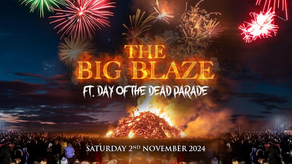 Giant bonfire and fireworks over a crowd. Text reads, 'Big Blaze, Ft Day of the Dead Parade'.