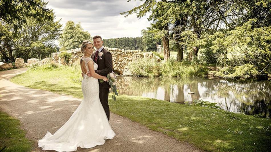 Bride and groom posing for photos.