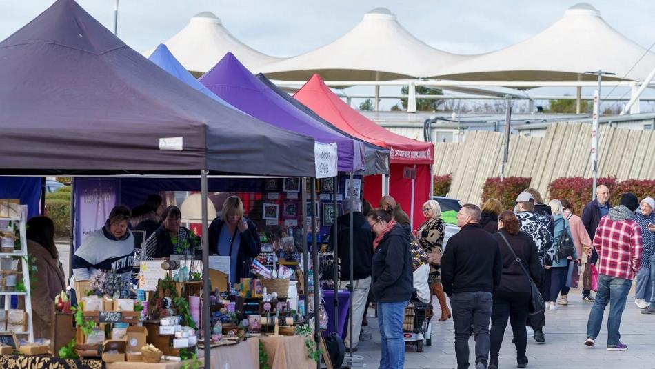 People browsing stalls at the Summer Artisan Market, Dalton Park Outlet & Outdoors