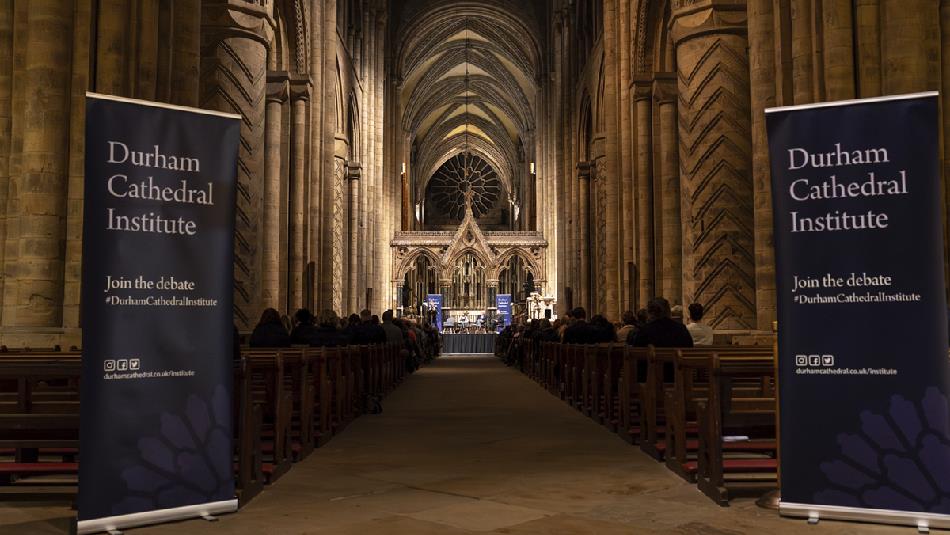 Banners which read, 'Durham Cathedral Institute' on either side of the Nave at Durham Cathedral