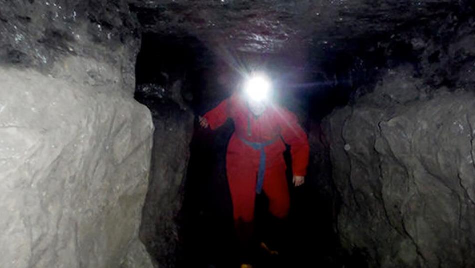 Adventurer exploring a mine.