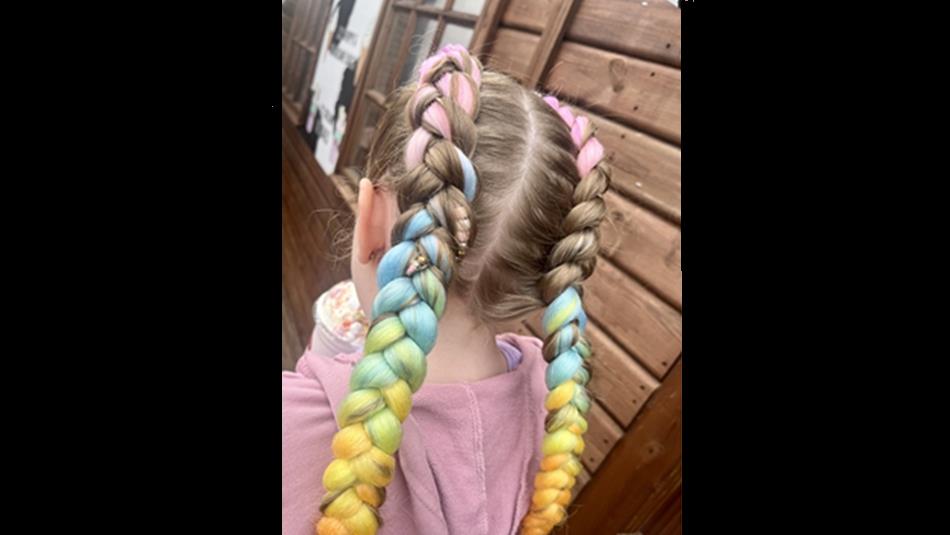 Young girl with coloured hair braids