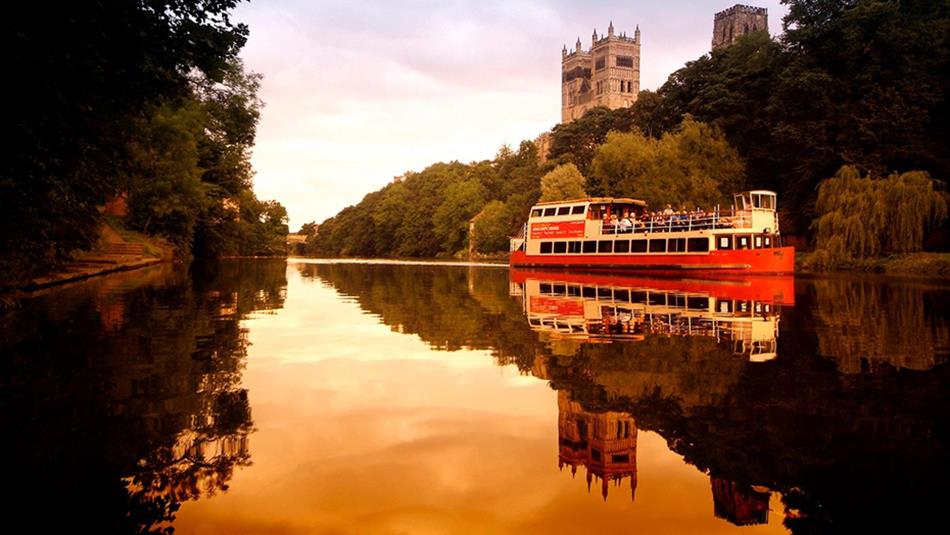 Prince Bishop River Cruiser on the River Wear with Durham Cathedral in the background.