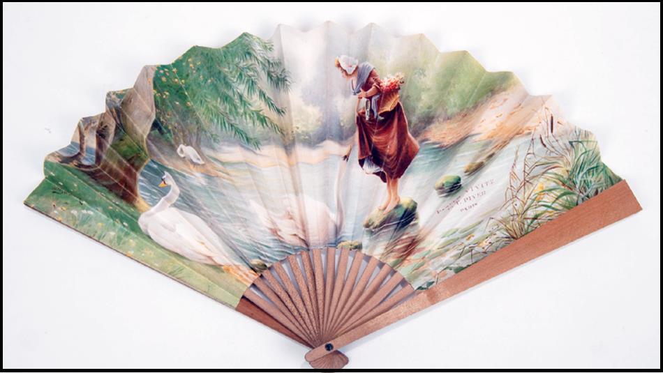 A historical fan with an image of a milkmaid displayed on a white background
